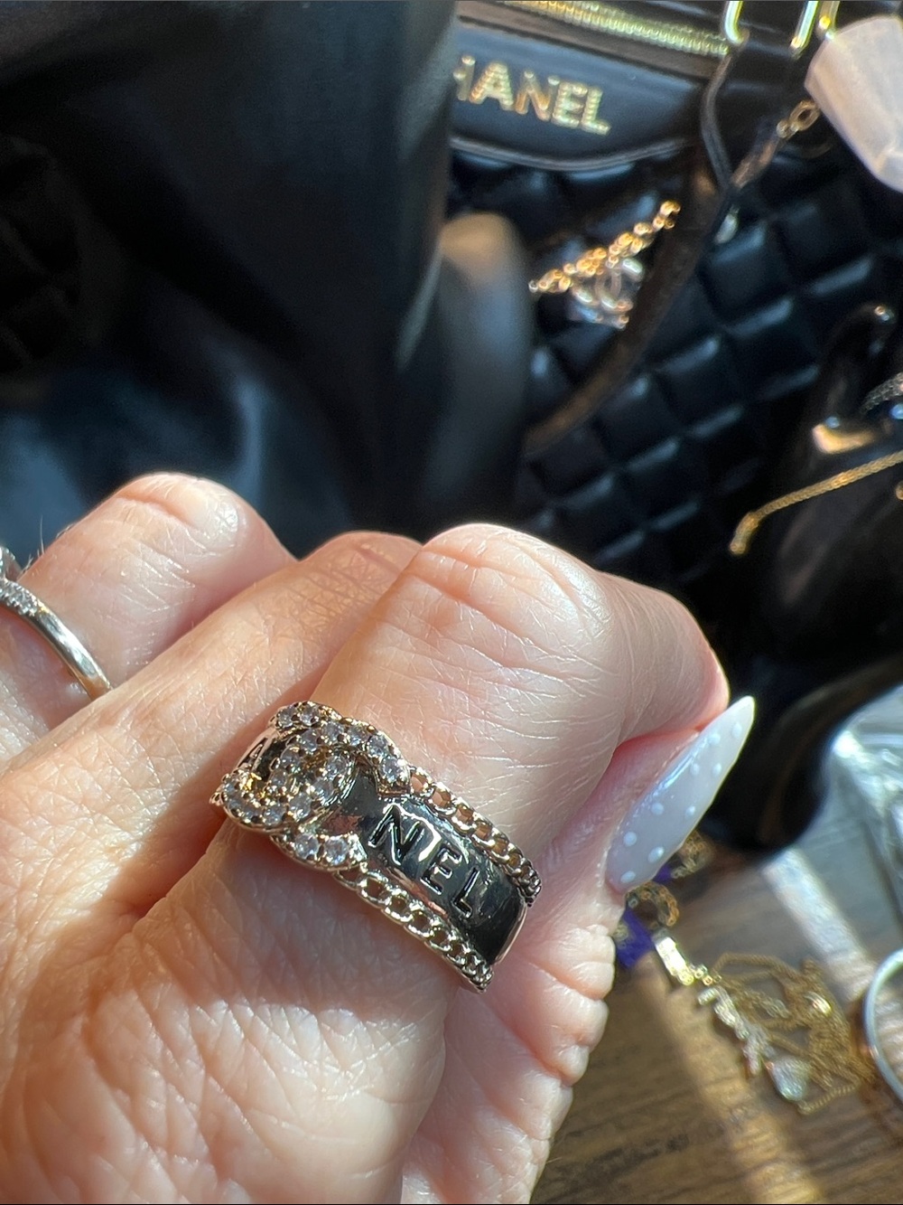 CHANEL Silver-Tone Crystal Logo Chain Ring in Silver